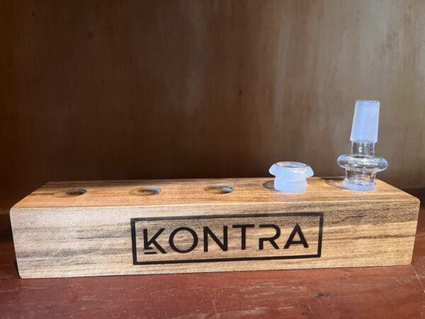 METTLE display rack shown on a wooden shelf